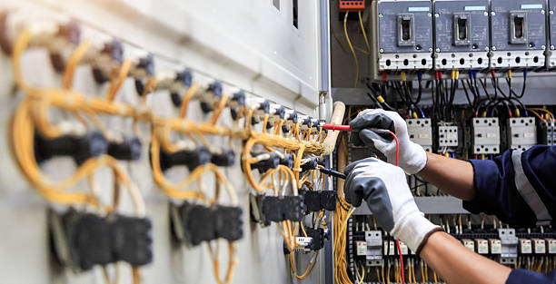Professional Electrician technician working in Gold Hill, OR